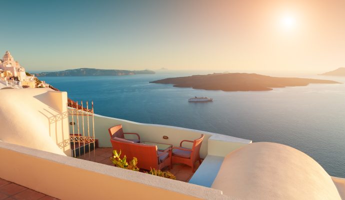 Beautiful,Sunset,At,Santorini,Island,,Greece.,Chairs,On,The,Terrace